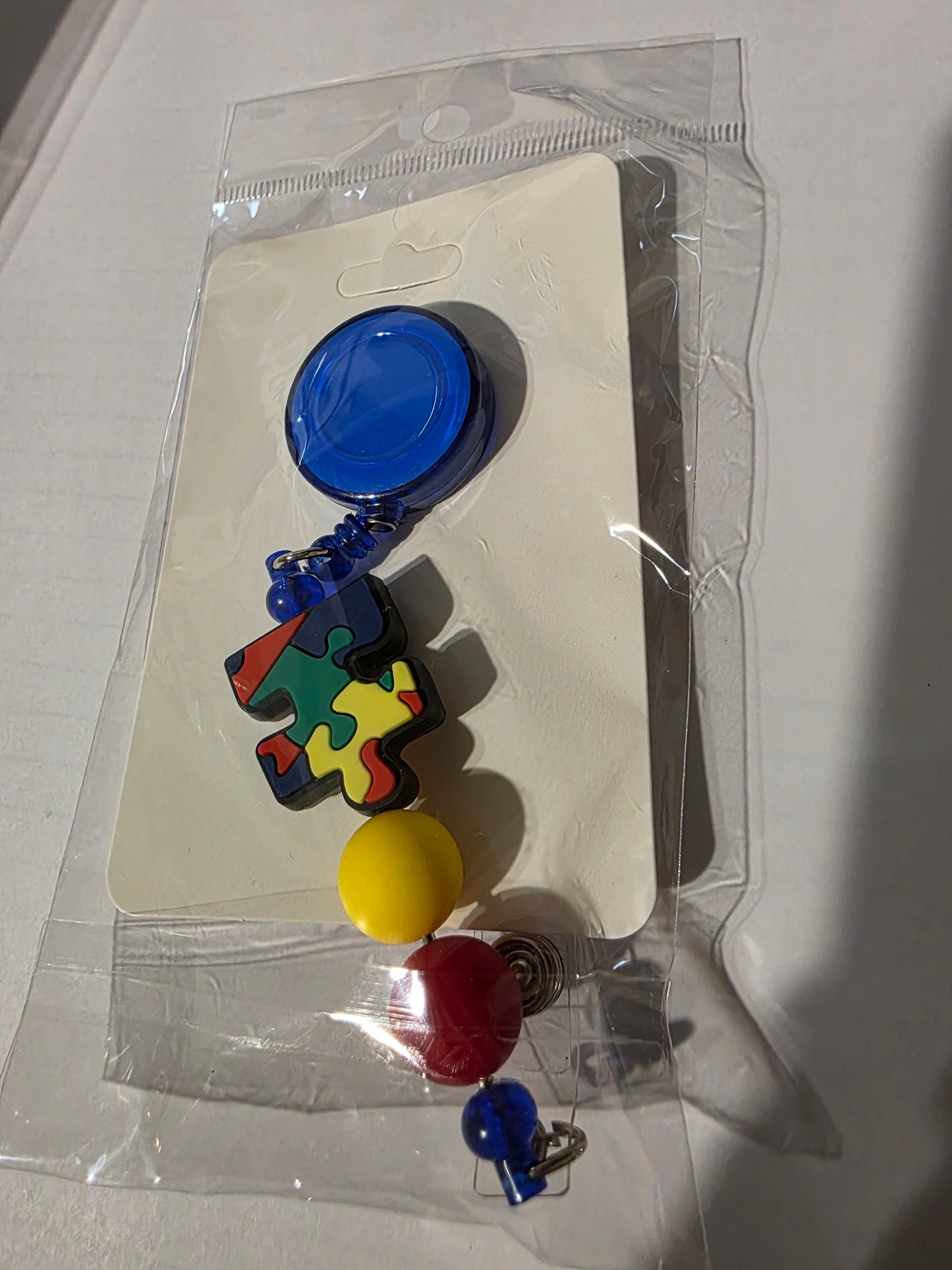 Autism Puzzle Piece Beaded Badge Reel