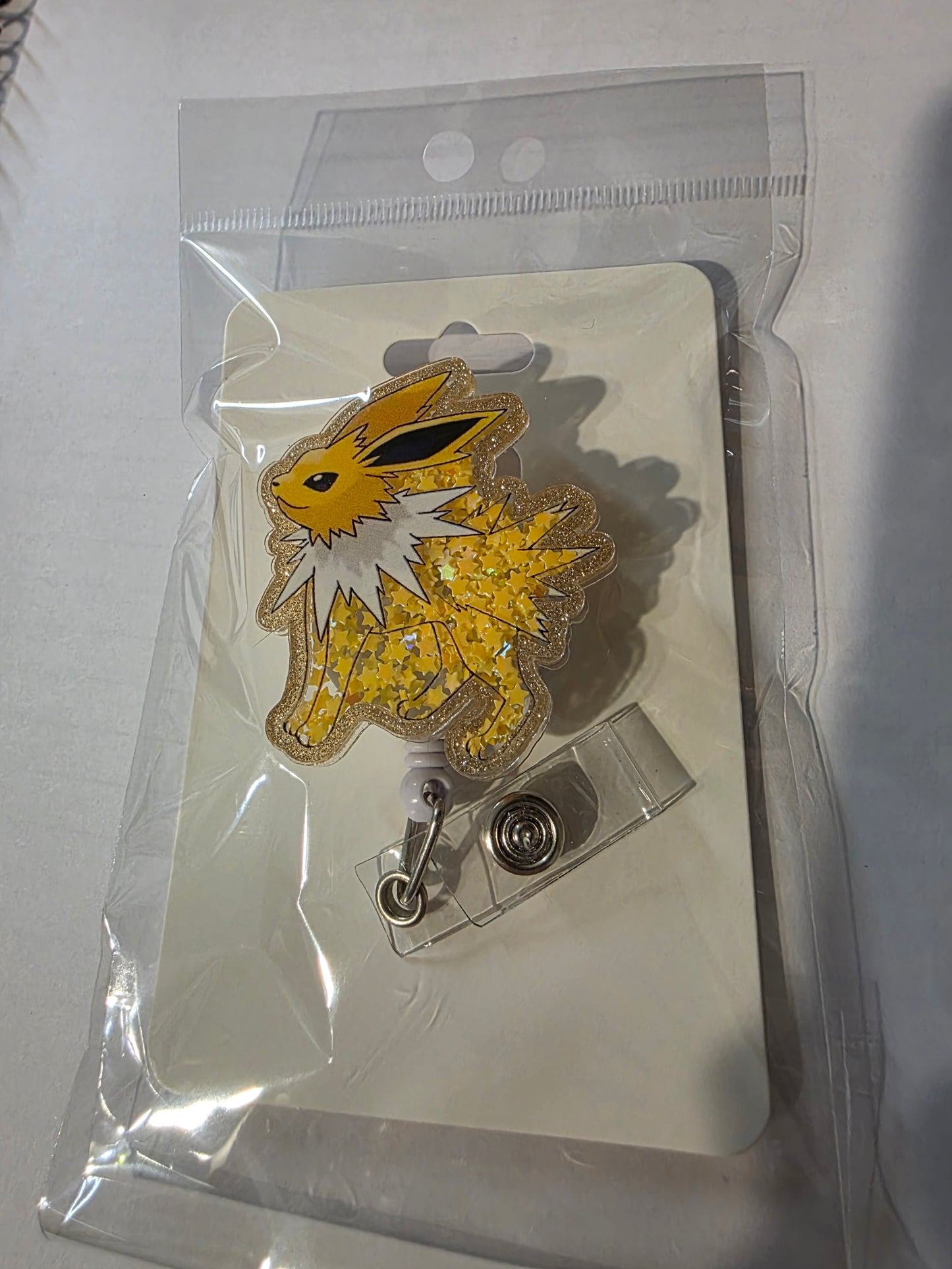 Jolteon Badge Reel