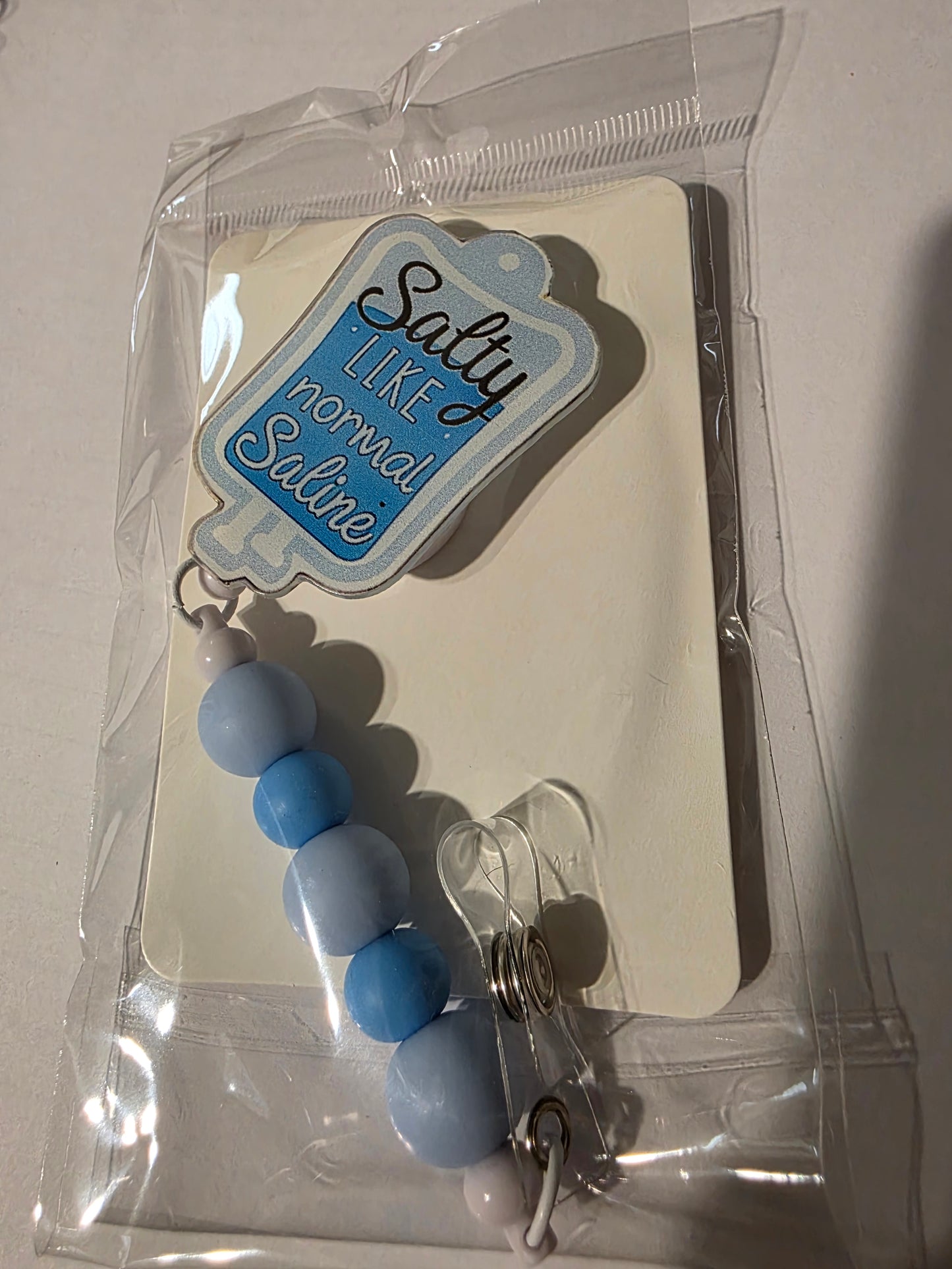 Salty Like Saline Badge Reel